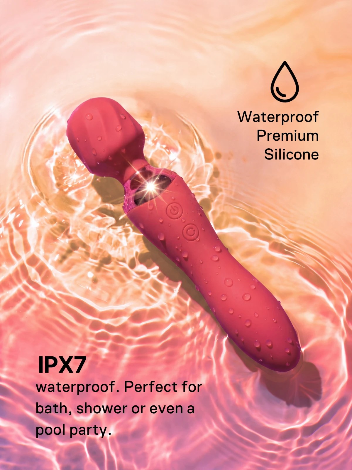 ThermaLuxe IPX7 waterproof wand vibrator made from premium red silicone, covered in water droplets and shown in water.