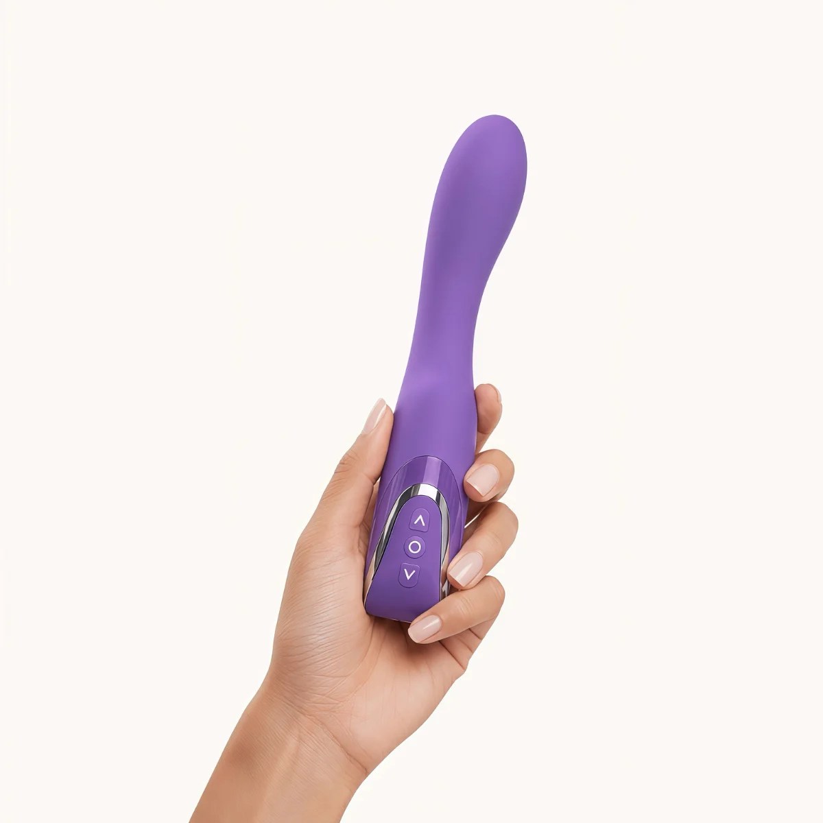 Hand showcasing Thrust Wave™ vibrator against a light grey background.
