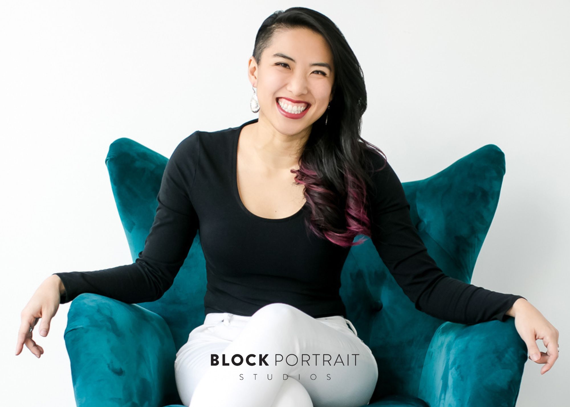 Asian woman posing for branding portrait at St. Paul photo studio.