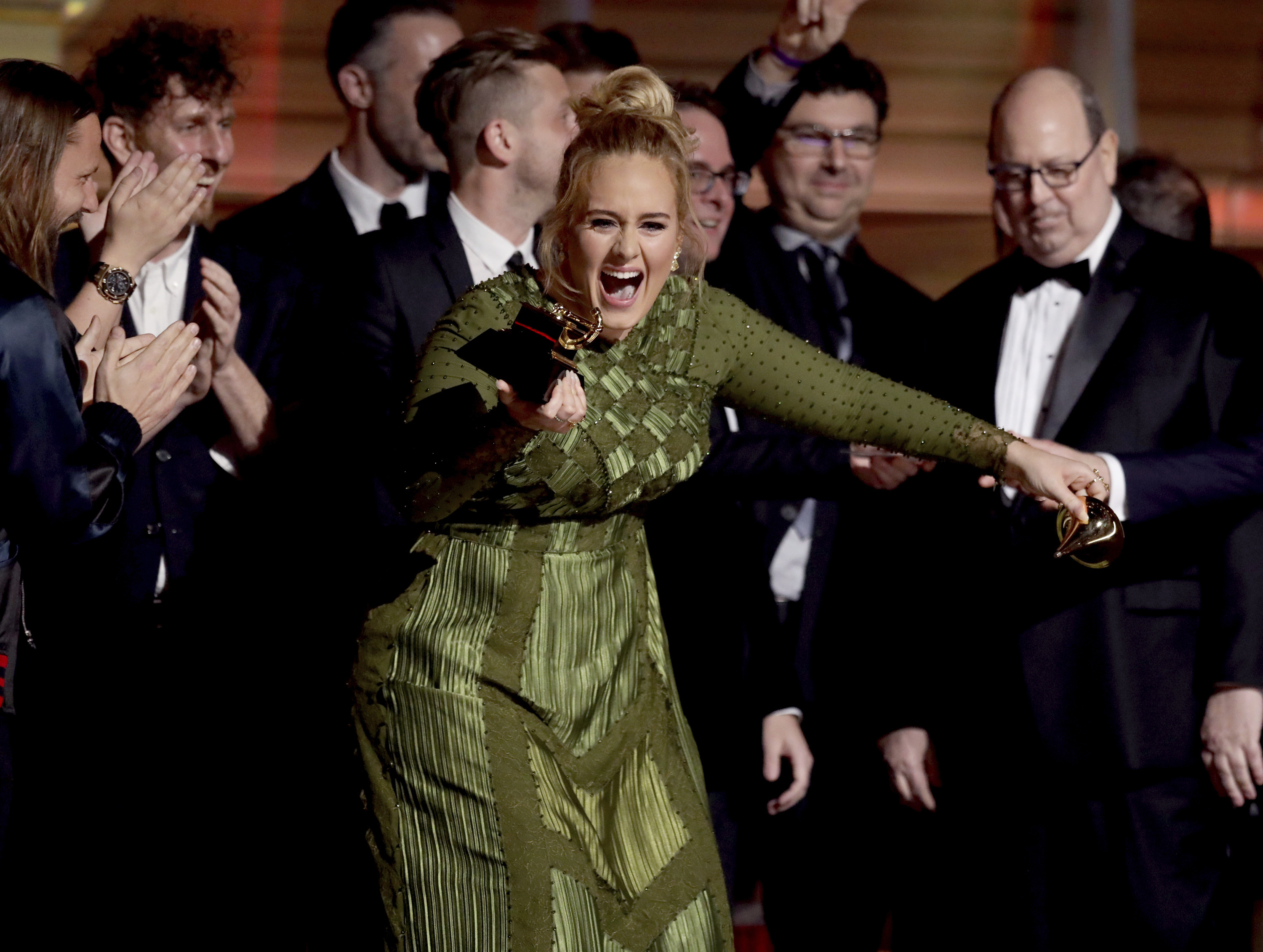 Adele accepts the award for album of the year for "25" at the 59th annual Grammy Awards on Sunday, Feb. 12, 2017, in Los Angeles. (Photo by Matt Sayles/Invision/AP)