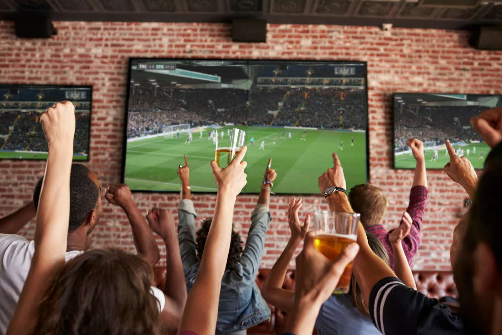 Fans Watching TV at Local Sports Bar