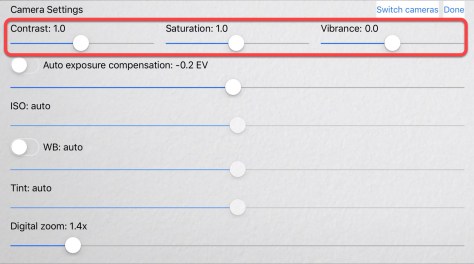 Breeze Booth 1.0.3 camera controls highlighting sliders for Contrast, Saturation and Vibrance