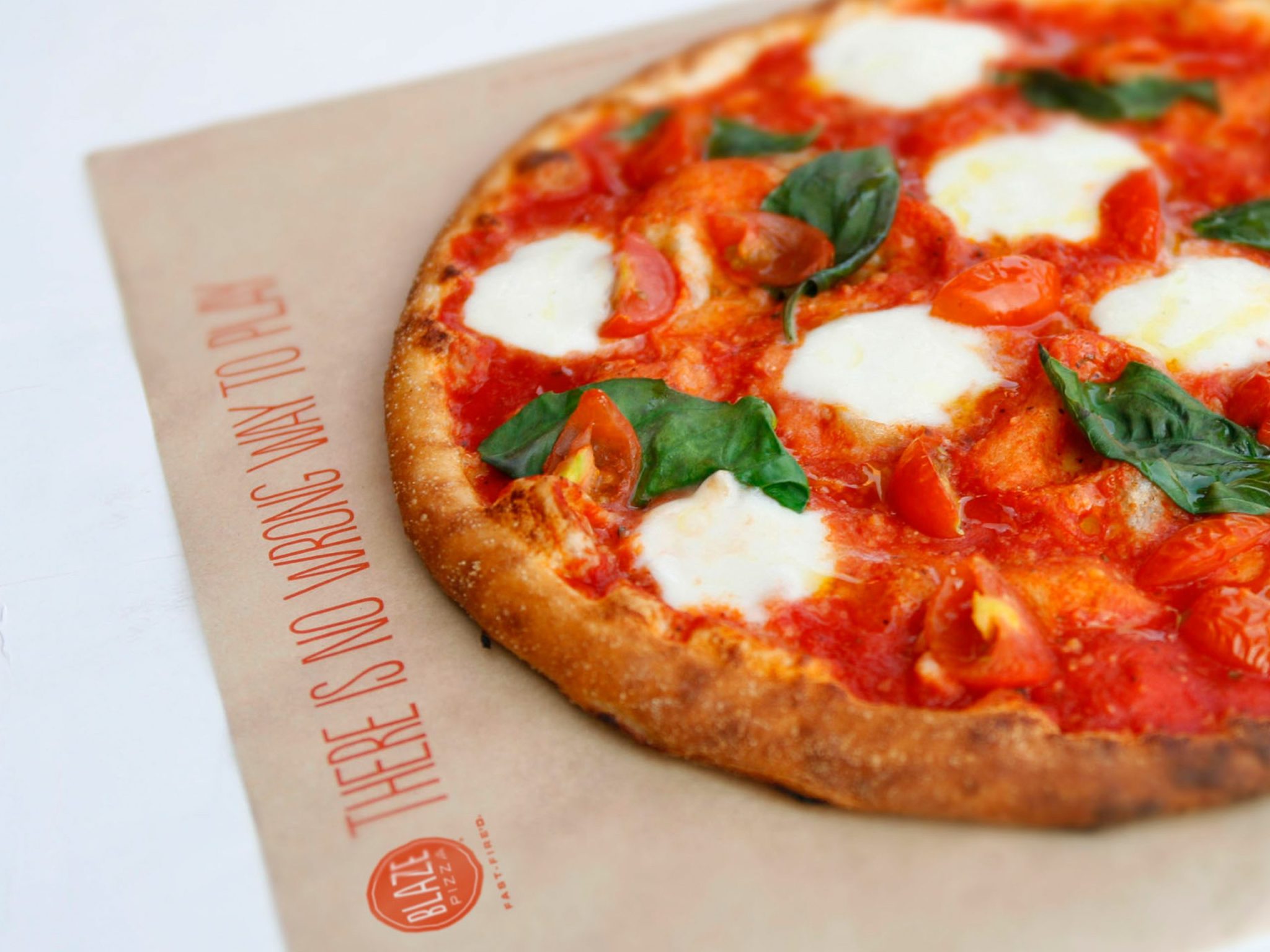pizza with tomato, cheese and basil