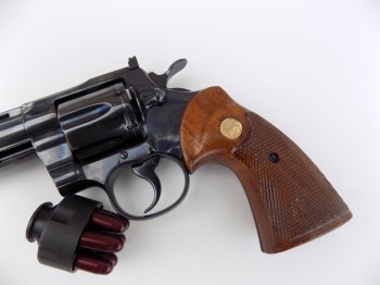 Colt Python revolver with speed loader