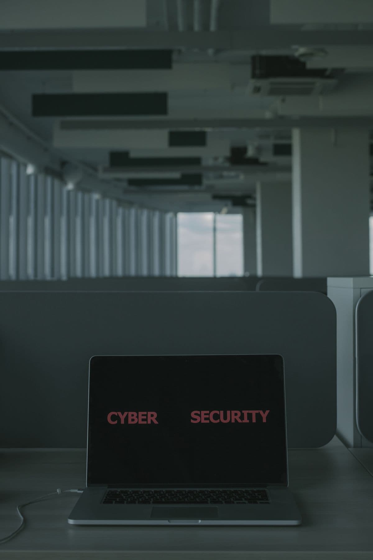 Laptop showing cyber security content during a secrets review