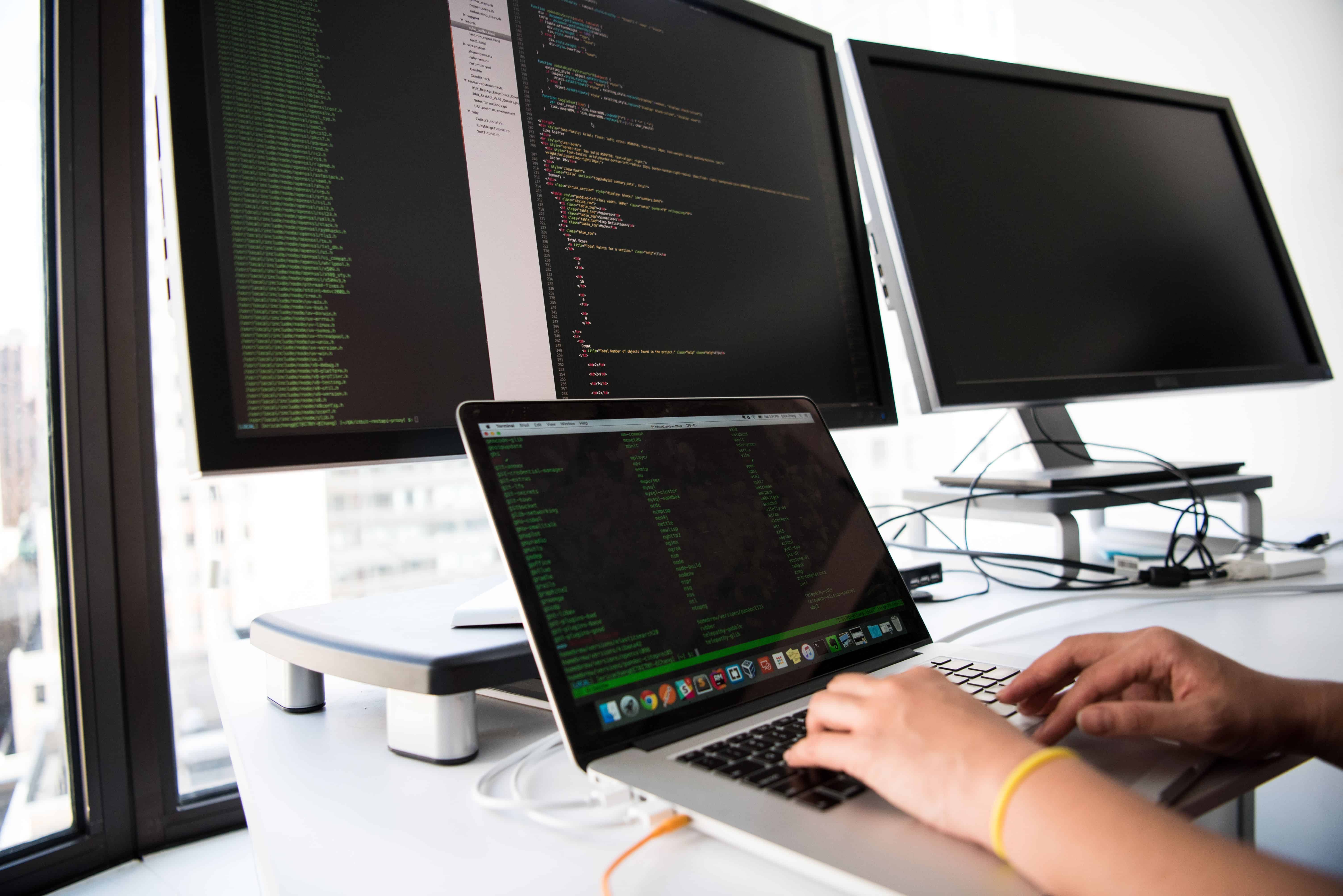 Analyst reviewing third party breach examples on a laptop dashboard