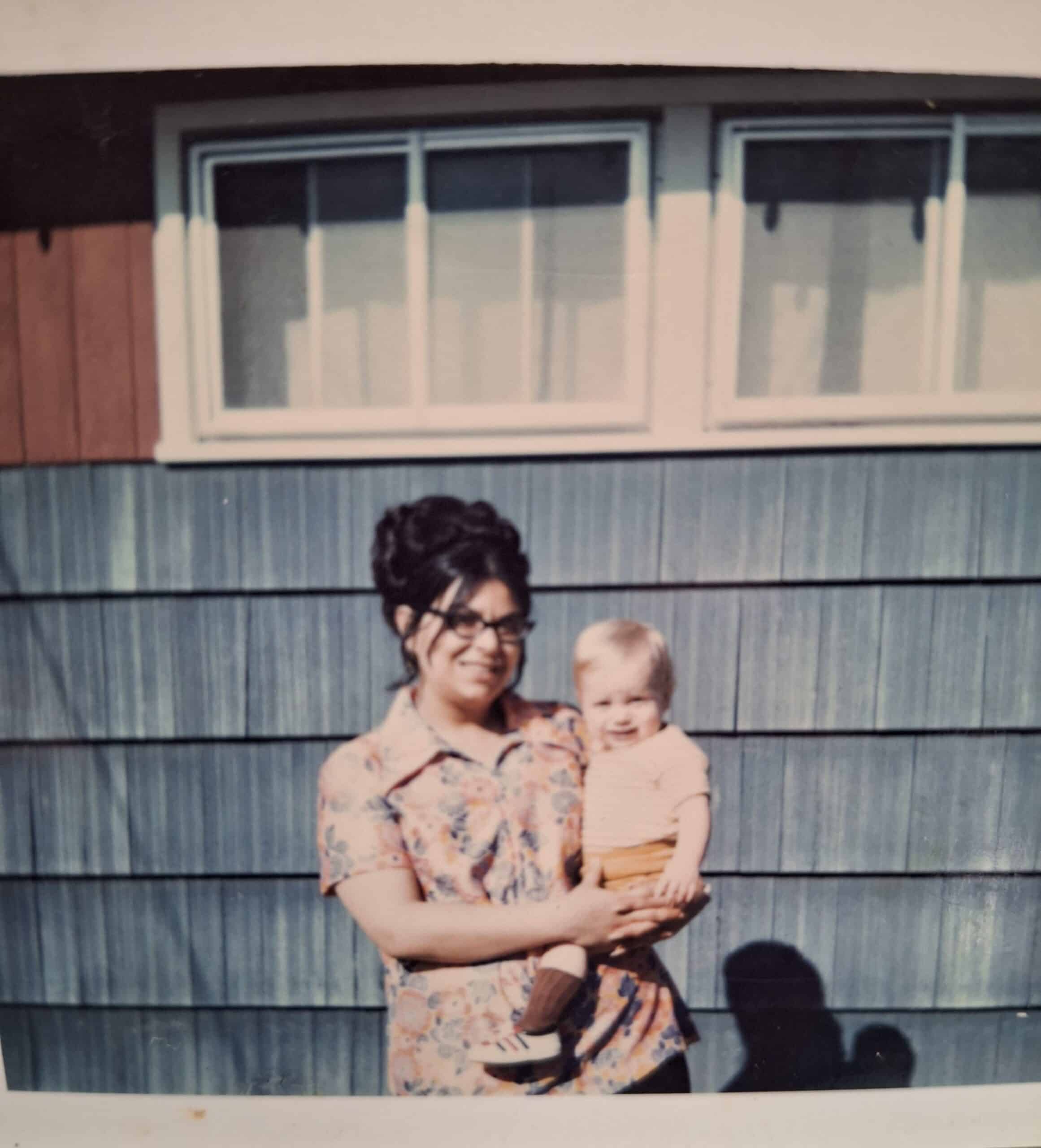 Carl with his adoptive mother, Louise De Lio. Photo enhanced and colors restored by MyHeritage