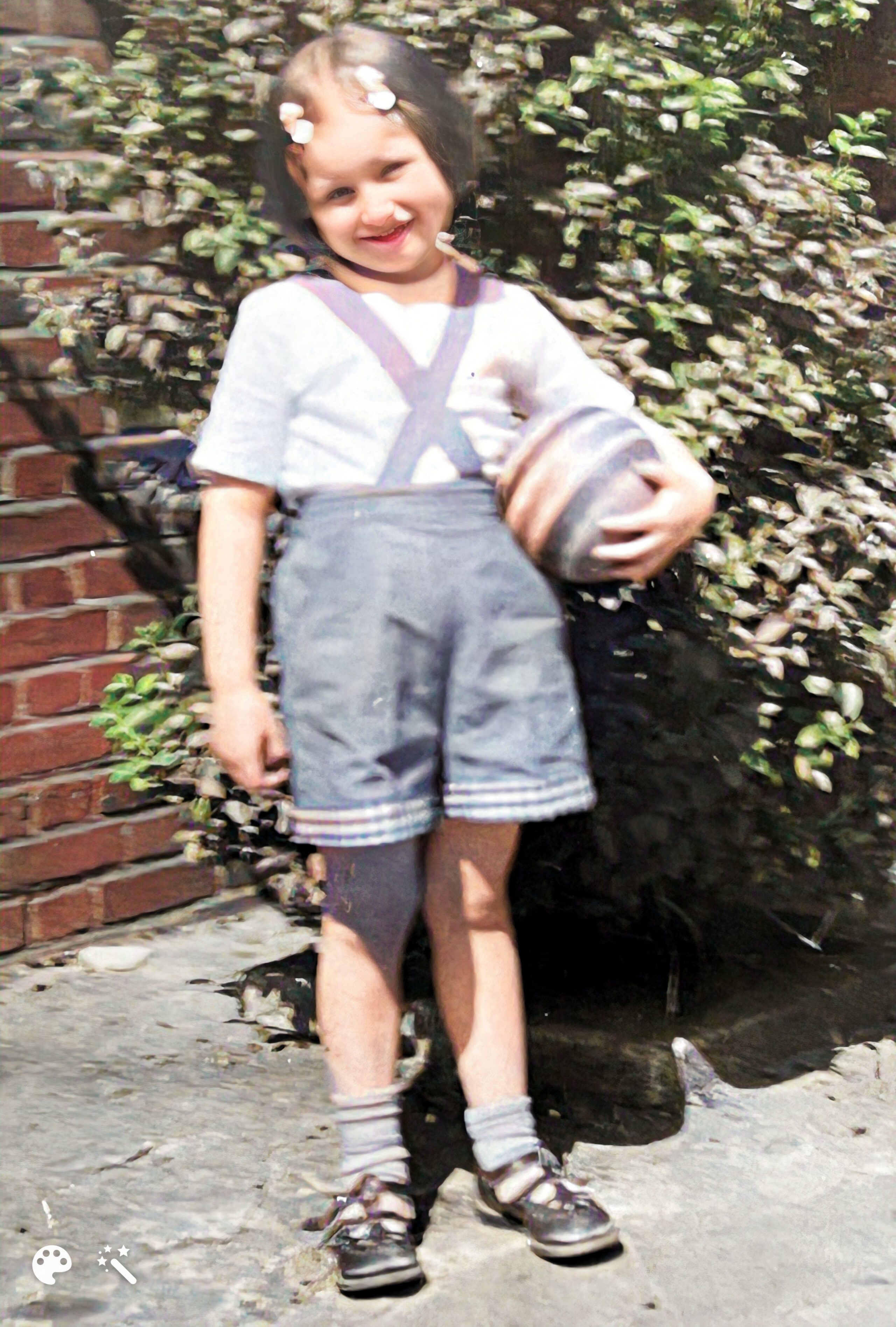 Cathy as a child. Photo colorized and enhanced by MyHeritage