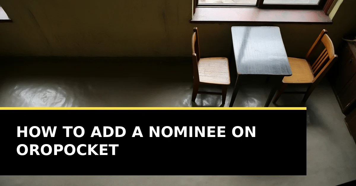 Two chairs at a small table by a window in soft daylight, one of them empty