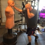I work my strikes during this workout, and stay as technically correct as I possibly can during the work set. This photo shows me working hard and keeping the non-striking hand high and protective.
