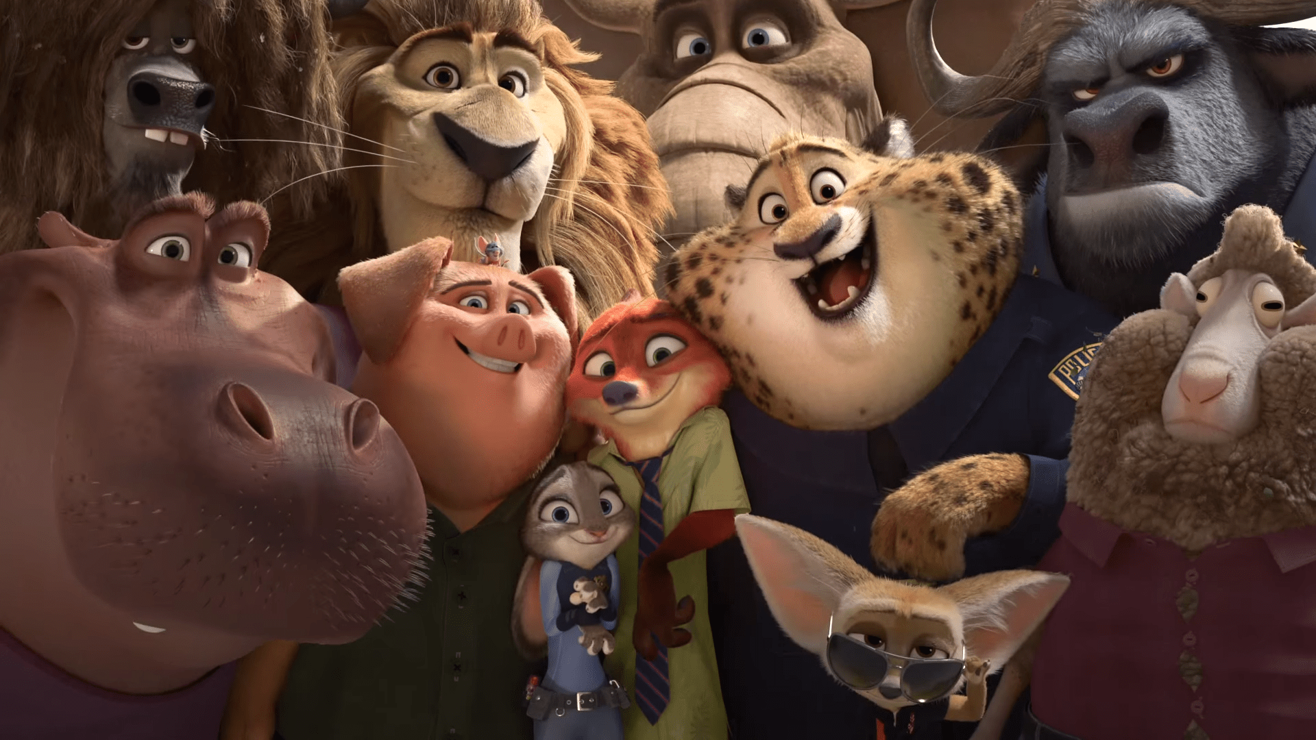 The main cast of Disney's Zootopia posing together, including Judy Hopps, Nick Wilde, Chief Bogo, and Officer Clawhauser, showcasing the diverse character design.