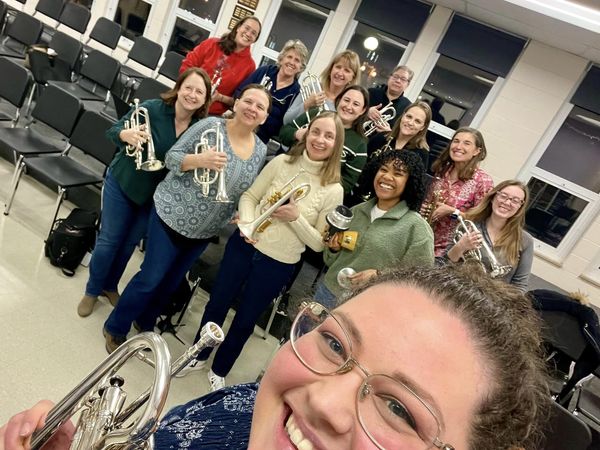 Dr. Erika Schafer (white sweater) and the cornet players in the Athena Brass Band.