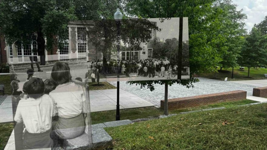 A composite image of the Guerry Center at University of Tennessee at Chattanooga. The present-day brick building, trees, and paved courtyard are overlaid with a black-and-white photo from the 1970s showing a large crowd of students gathered outside the building.