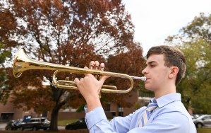 Students and community members play Taps as part of the TAPS project, Thursday, Nov. 11, 2021 to observe Veterans’ Day.