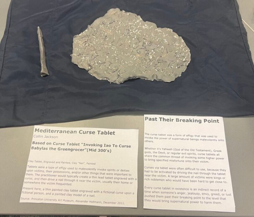 Freshman Collin Jackson's model of a curse tablet was one of the "Tools of the Trade" displayed by Dr. Kira Robison's "Medieval Magic and Medicine" course.