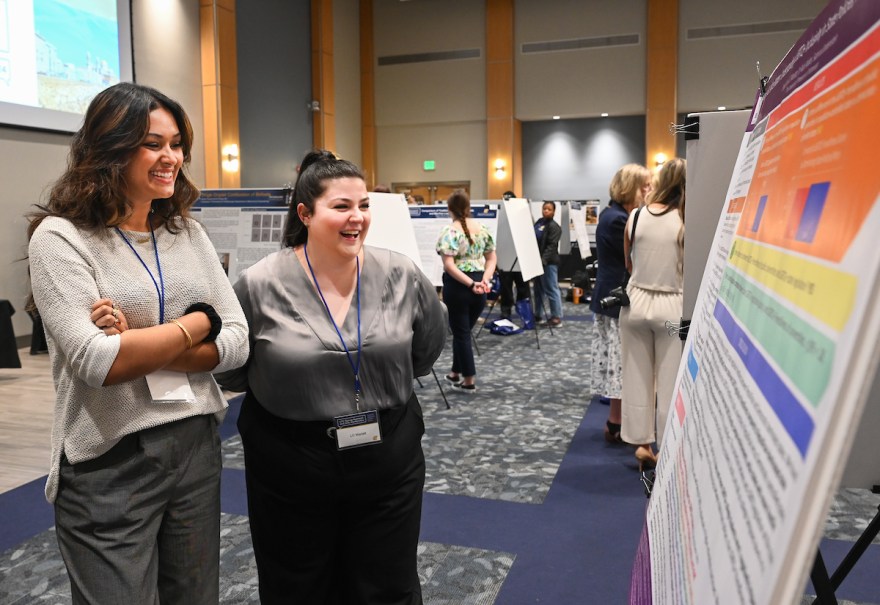 Graduate student Shyla Khan and senior LC Marlatt.