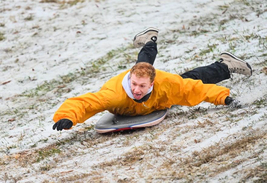 Graham Davis celebrates Snow Day 2024 on Chamberlain Field.