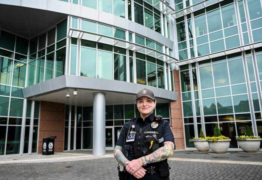 Officer Ellen Centers poses outside of the UTC Library.