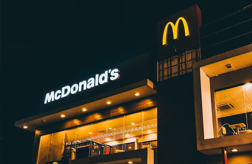 people standing near restaurant chain