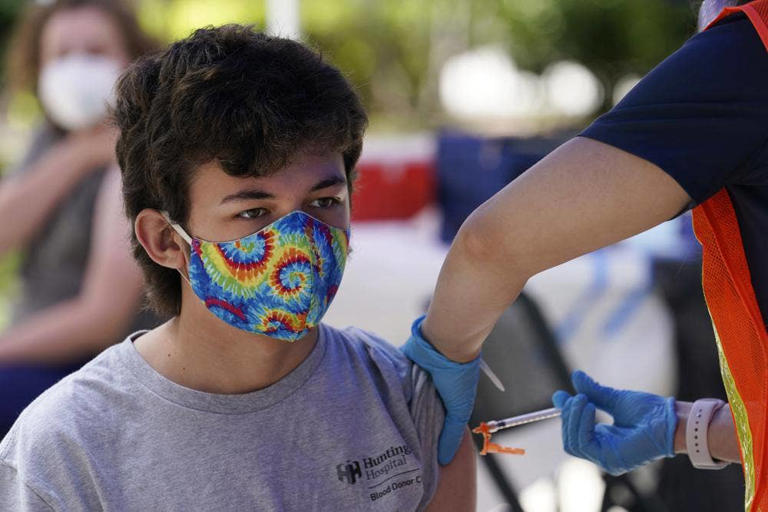 Finley Martin, 14, is seen getting a shot of the Pfizer COVID-19 vaccine at the First Baptist Church of Pasadena, May 14, 2021, in Pasadena, California. AP Photo/Marcio Jose Sanchez, File Finley Martin, 14, is seen getting a shot of the Pfizer COVID-19 vaccine at the First Baptist Church of Pasadena, May 14, 2021, in Pasadena, California. AP Photo/Marcio Jose Sanchez, File