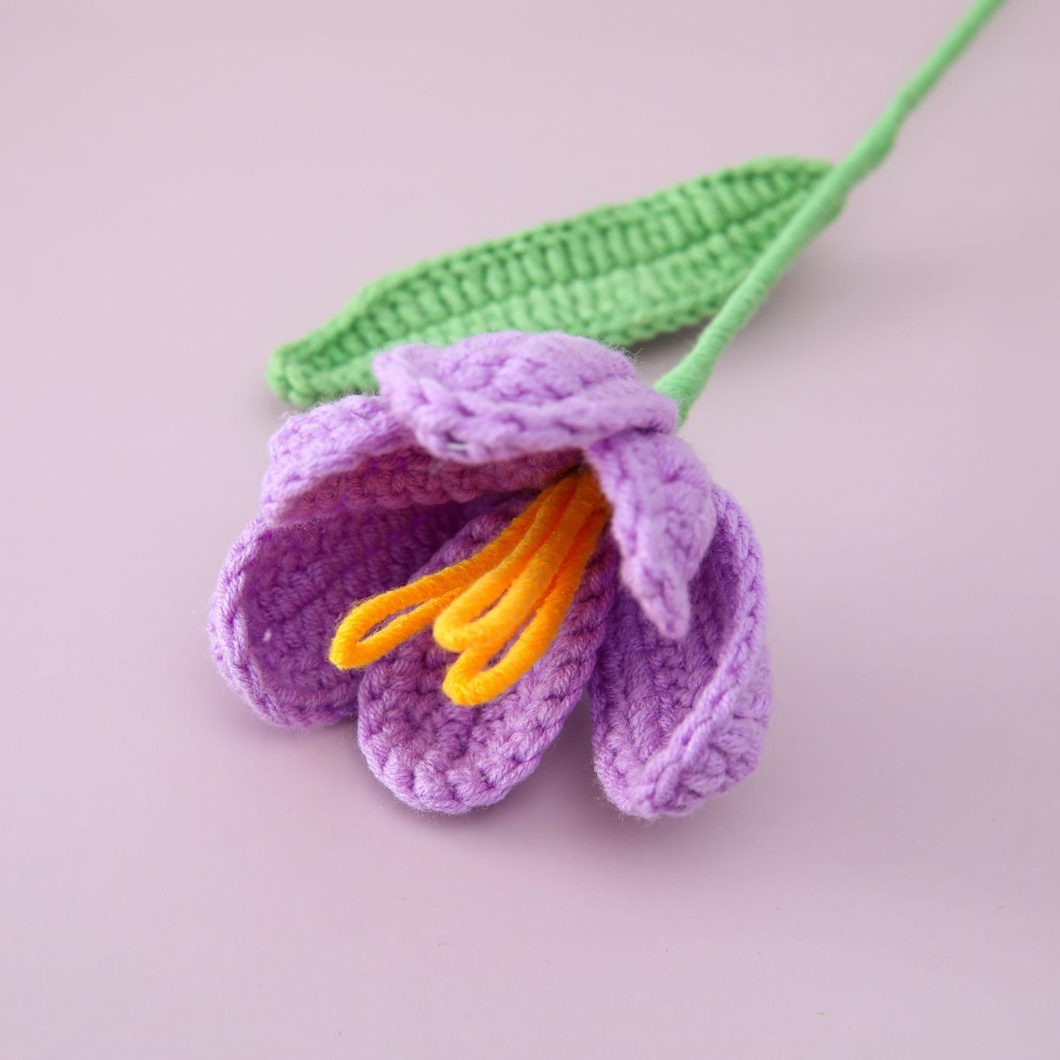 Crochet tulip yarn flowers in the vases