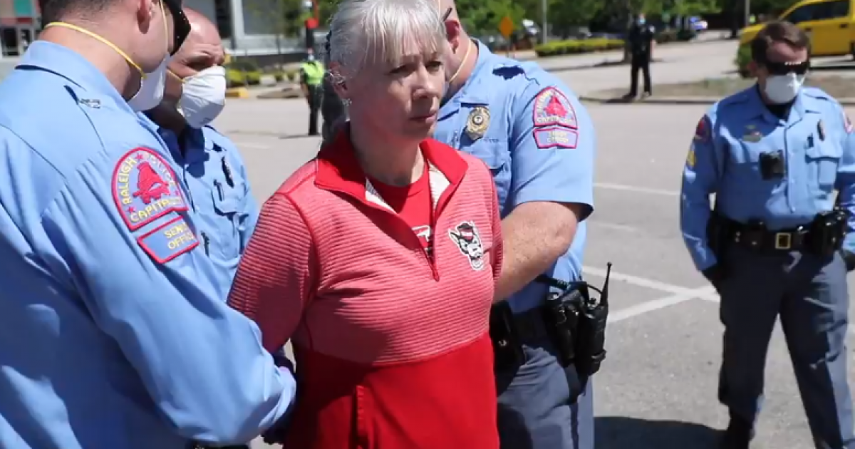 North carolina cops threaten and arrest 'non-essential' protesters for unauthorized free speech