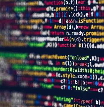 pexels photo 2004161 Vivid, blurred close-up of colorful code on a screen, representing web development and programming.