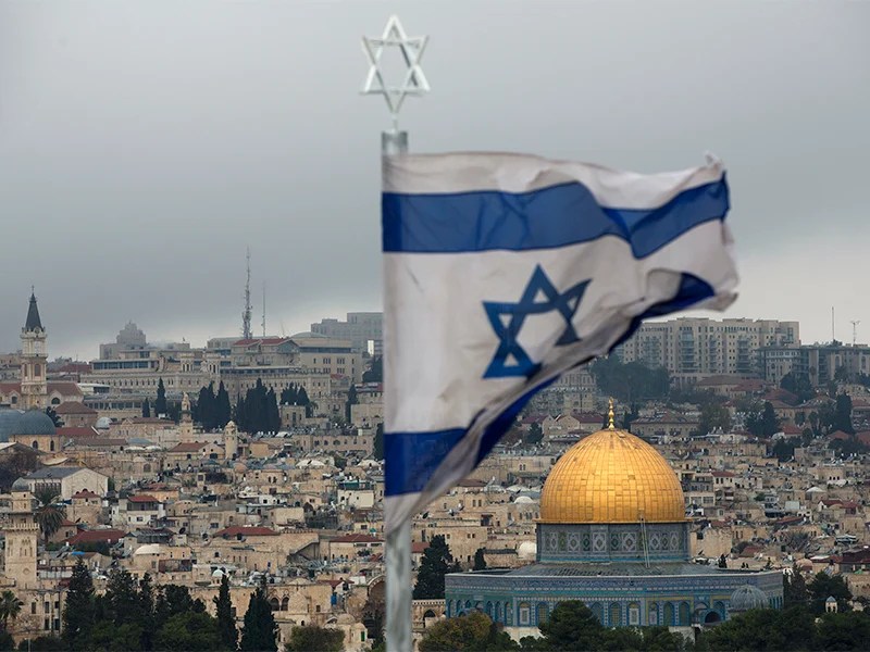 Jerusalem behind Israel flag