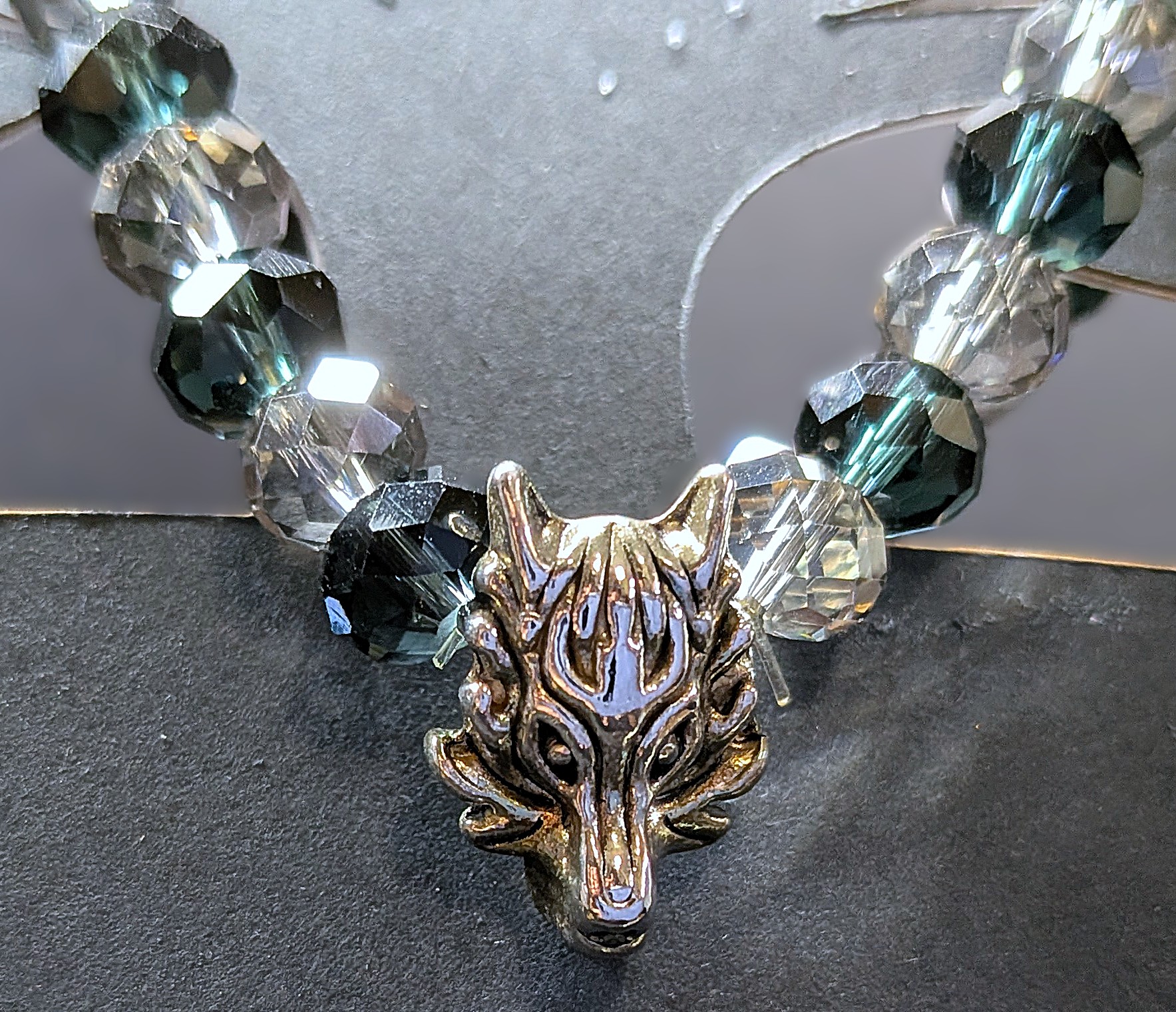 WOLF HEAD WITH FACETED BEADED GLASS BEAD BRACELET