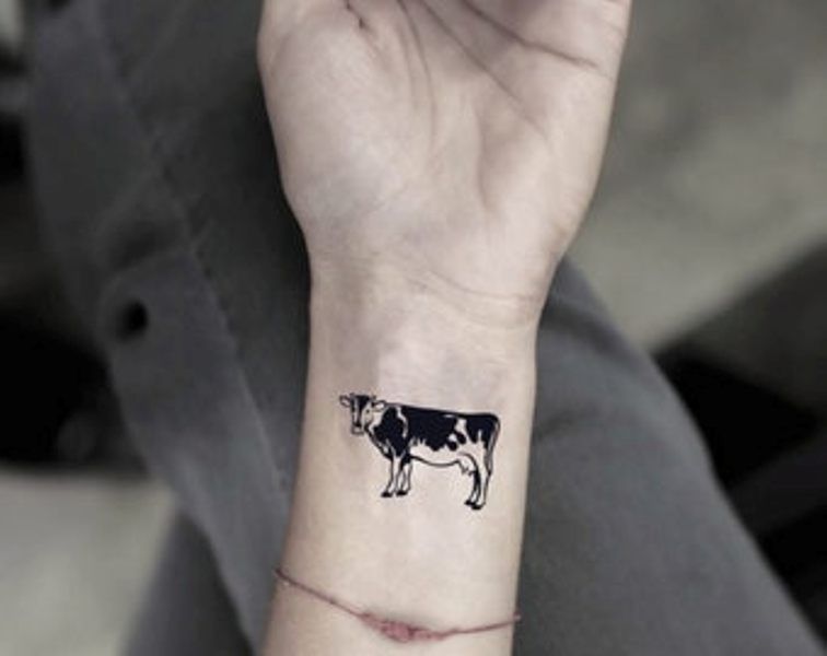 50+Amazing Cow Tattoos With Meanings - Body Art Guru 600_x_756_jpg