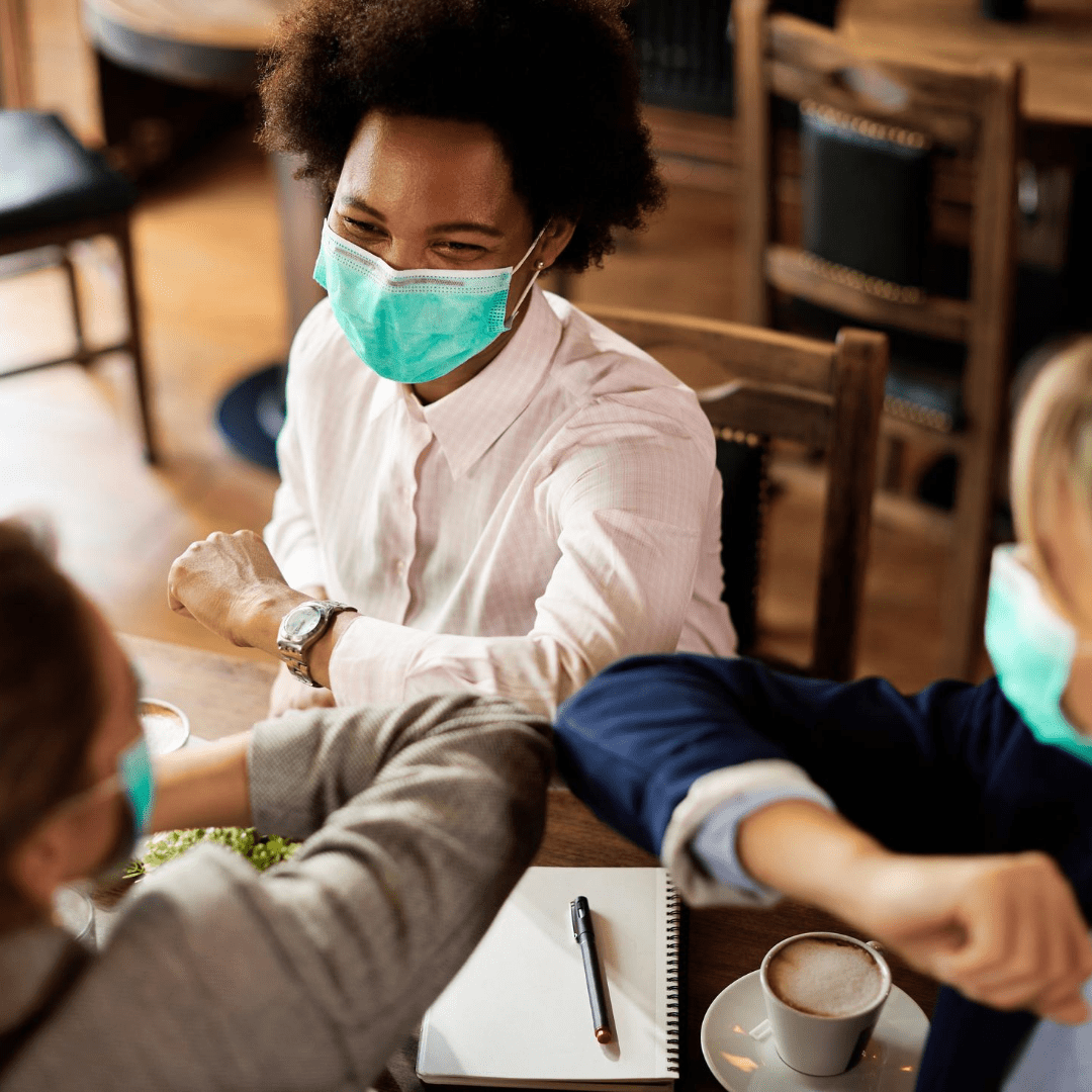 Elbow bump in greeting