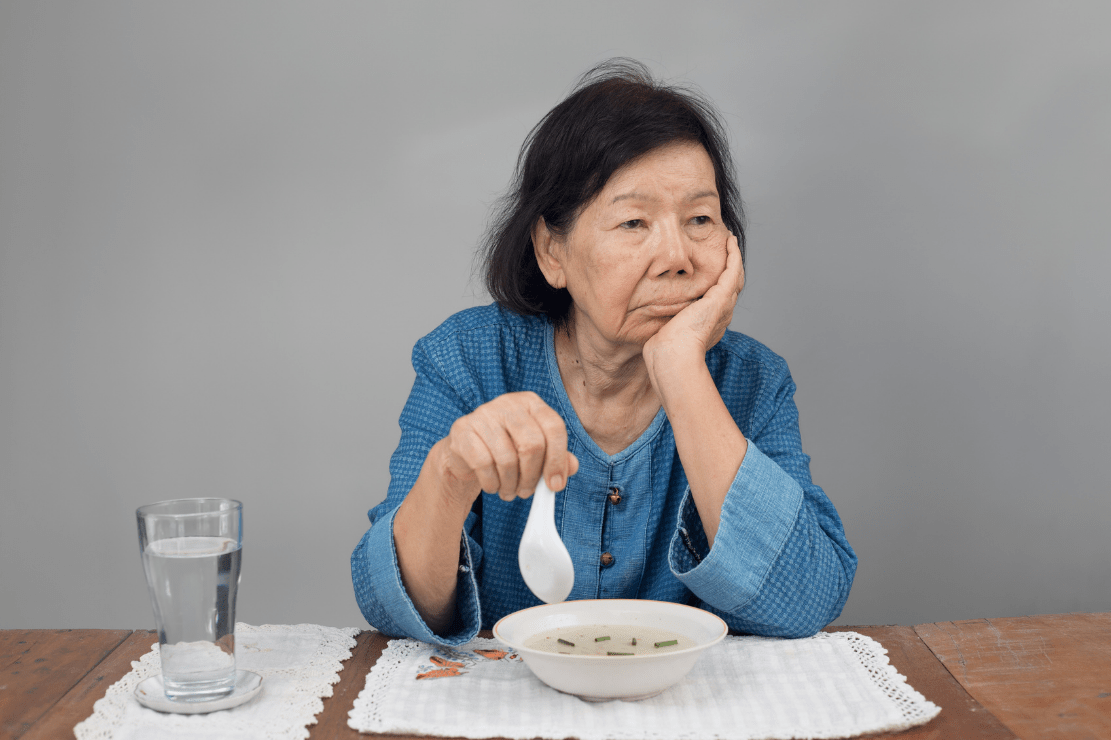 Bored woman eating
