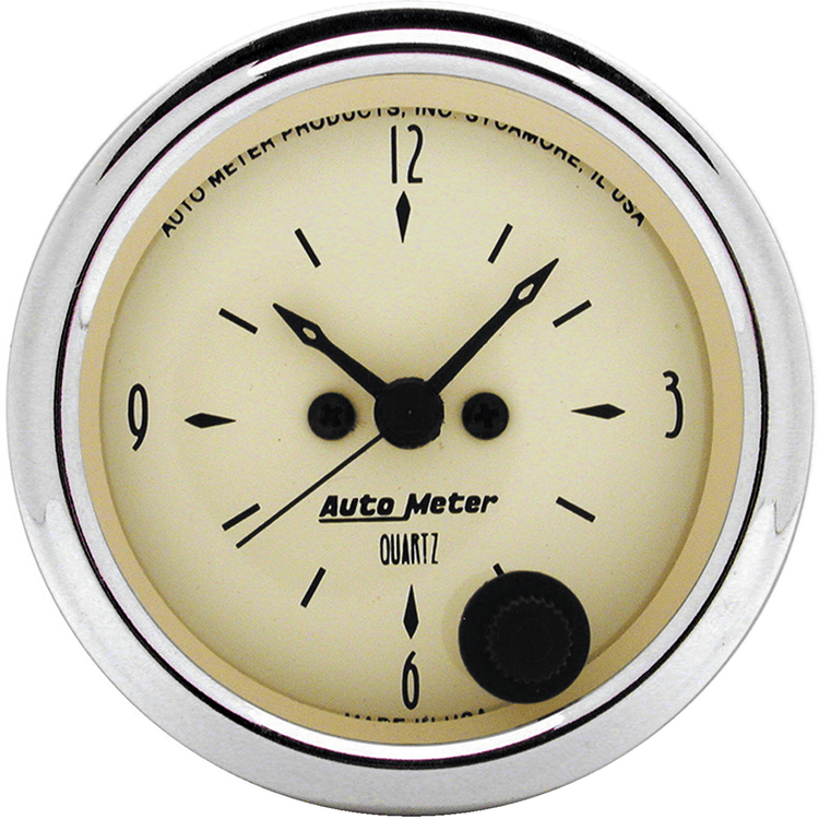 1885 Auto Meter Antique Beige 2 1/16" Quartz Clock 12 volt or 16 volt