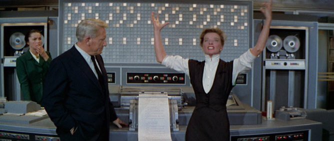 Screencapture of Tracy and Hepburn in the movie The Desk Set.