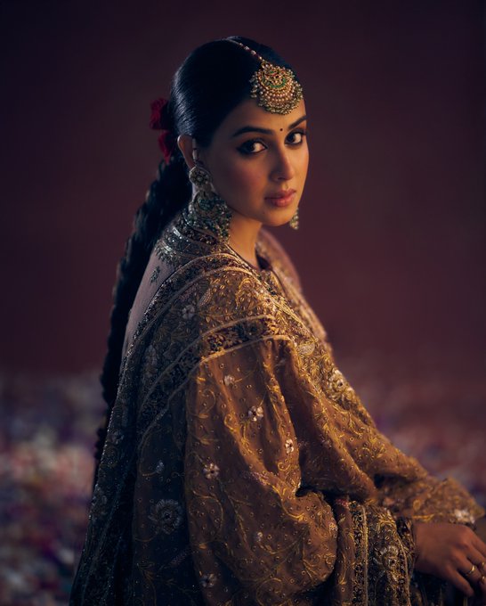 Genelia deshmukh looks pretty in yellow  brown lehanga at Anant Radhika wedding