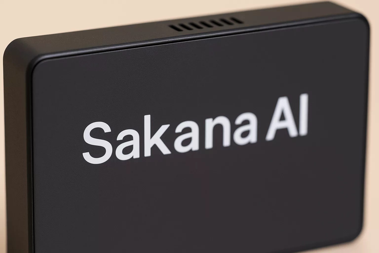 A black rectangular device with the text Sakana AI written in white letters on its surface, inspired by cutting-edge technology from Japan and ideal for any local model shop.