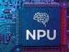 AI PC Reality Check: NPU, CPU, GPU Close-up of a computer chip labeled NPU with a brain-shaped circuit design, mounted on an AI PC motherboard alongside visible electronic components.