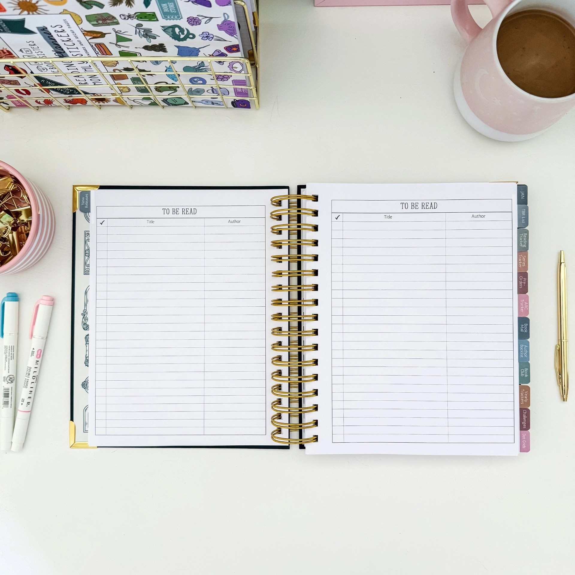 Blank To Be Read tracker spread with title and author columns across two pages, tabbed for TBR List, ARC Tracker, and Book Mail sections