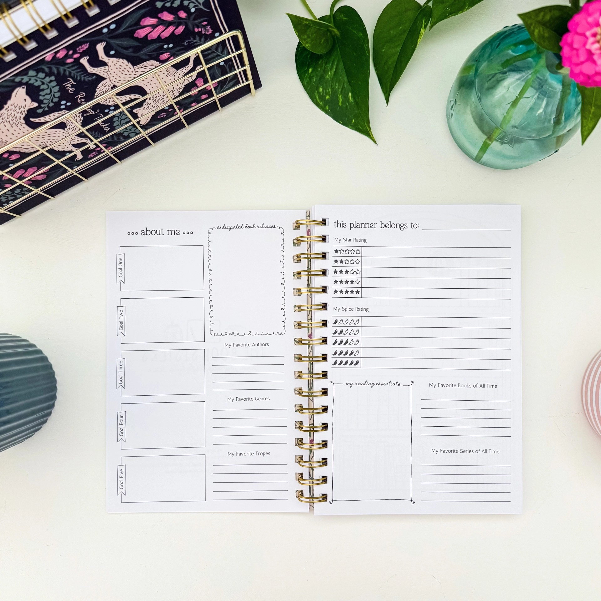 Reading Tracker interior spread with the about me goals page and planner ownership page with star and spice rating keys