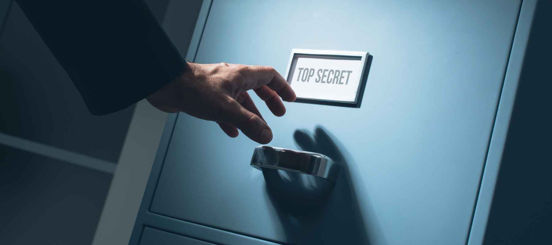 man reaching into cabinet for seo secrets for a cleaning business