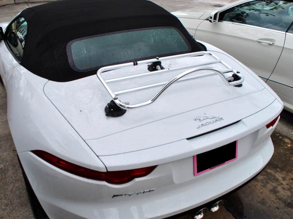 white jaguar f type convertible with a stainless steel revo rack pa luggage rack fitted photographed from above