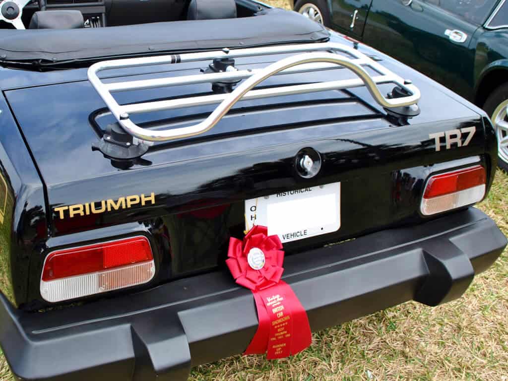 Revo rack pa luggage rack fitted to a black Triumph TR7