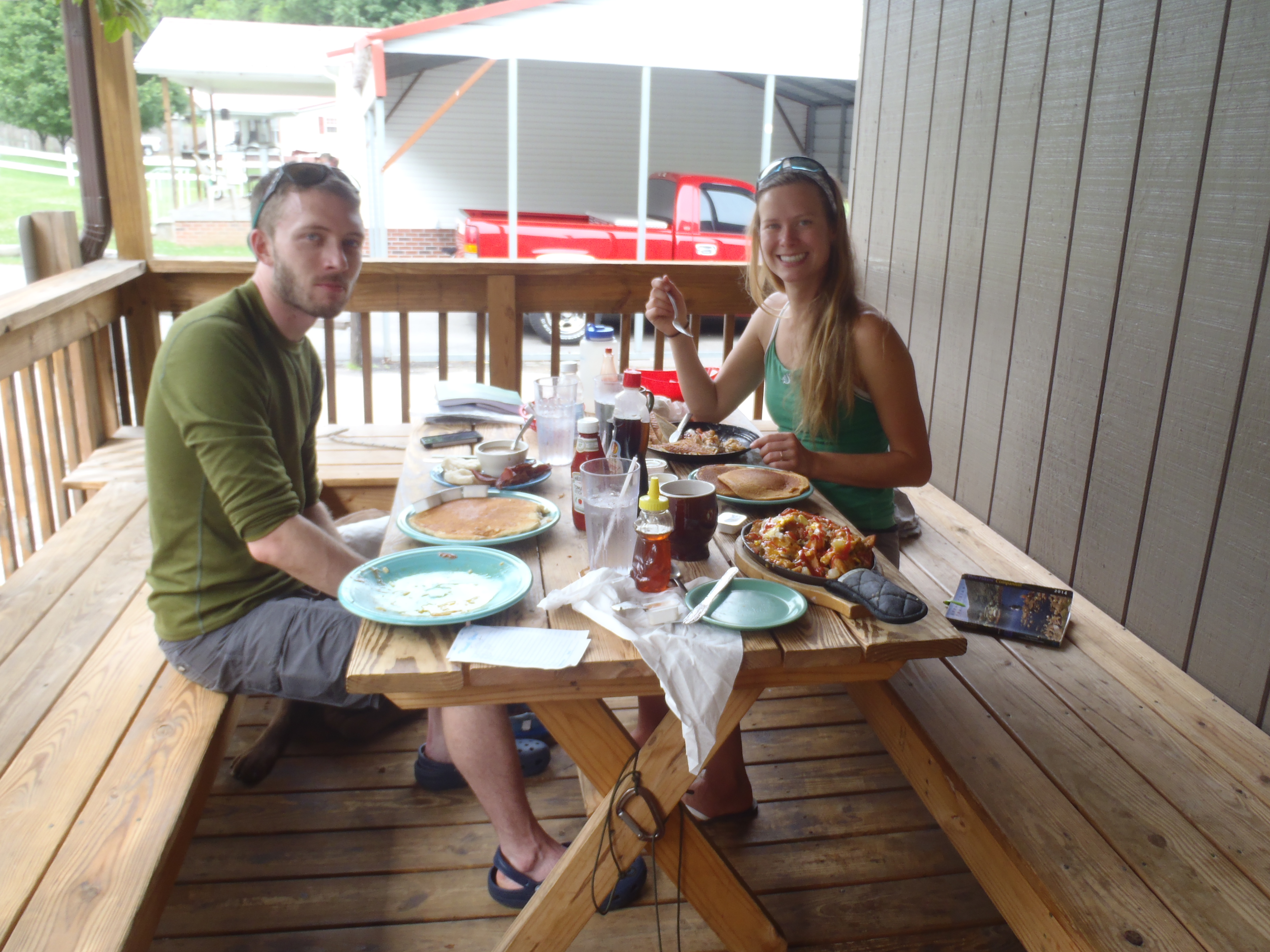 Lindsay and George, our new hiking buddy, eating breakfast in Hot Springs