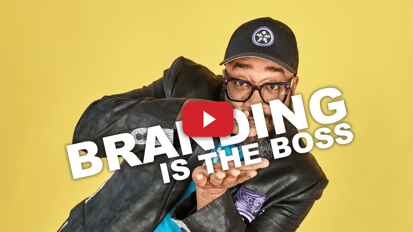 Picture this: An authoritative figure, rocking a cap and glasses, confidently points at the powerful declaration: "BRANDING IS THE BOSS." A bold YouTube play button masks their face—a symbol of action calling you to watch and learn. The electric yellow backdrop isn't just eye-catching; it's your roadmap to skyrocketing your podcast audience organically. This is where you master the game of audience engagement and brand elevation! 🚀📈 - Boss Uncaged™ OmniMedia Inc.