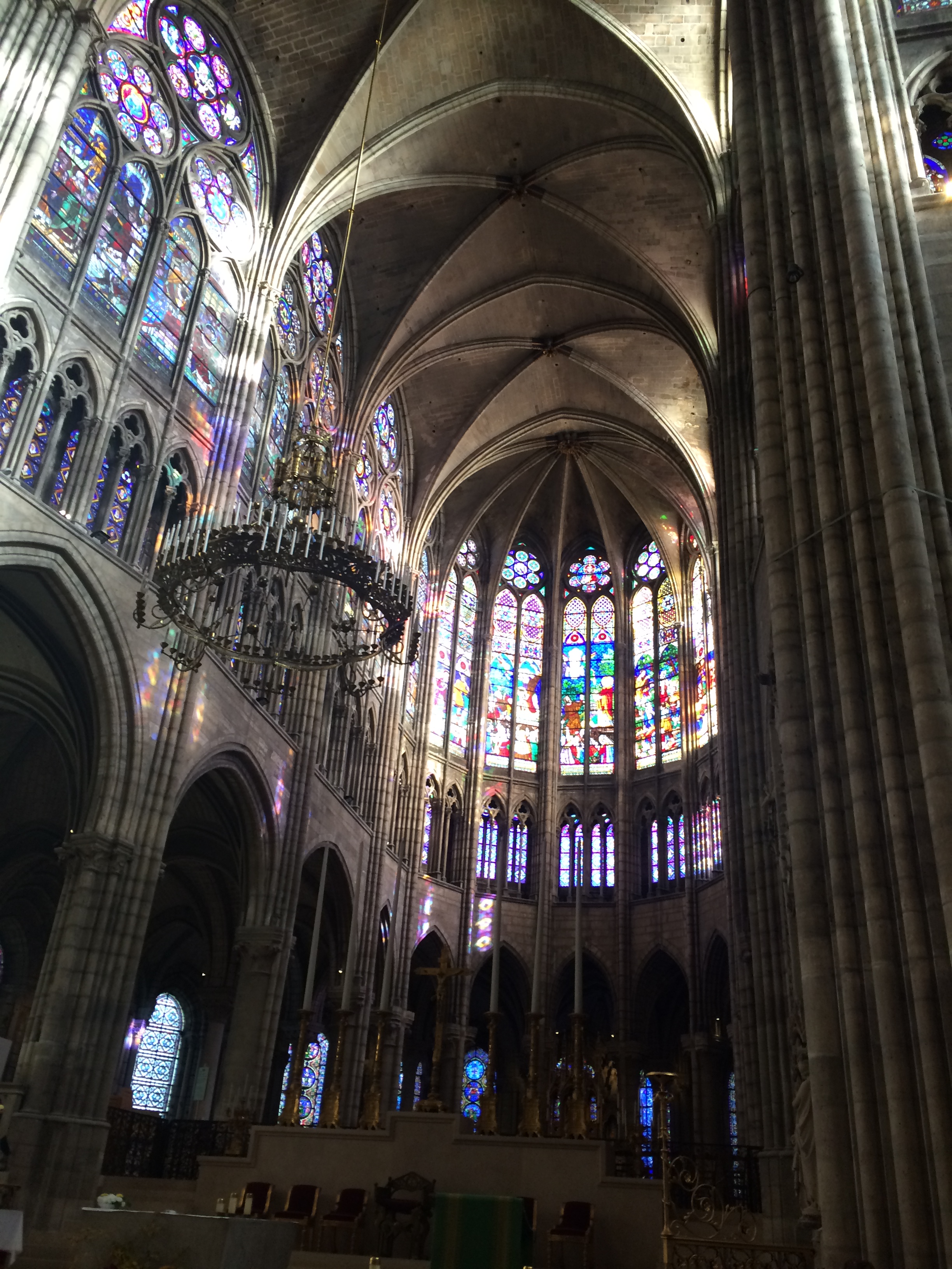 Exploring the Basilica of Saint-Denis in Paris while reading