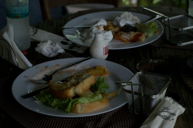 A couple of plates of food on a table