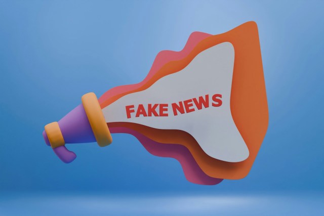 a fake news megaphone with the word fake news coming out of it