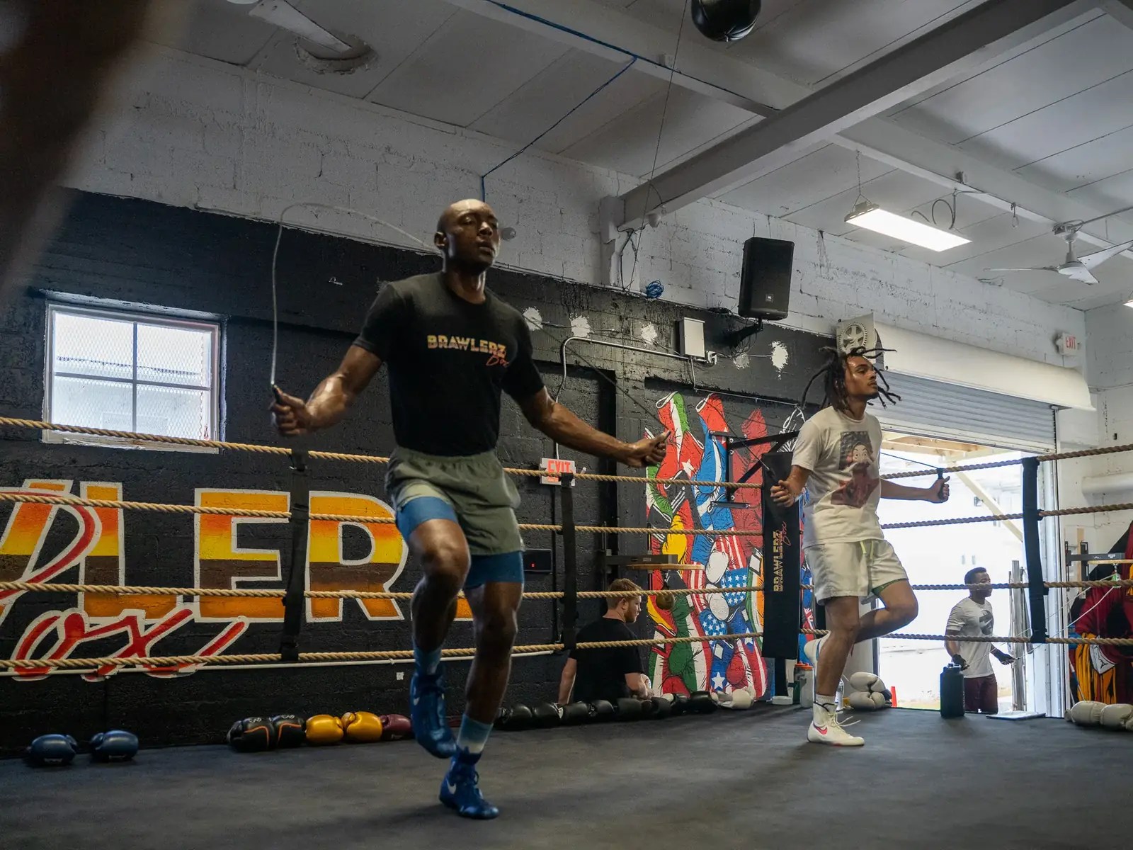 Members jumping rope beside the ring