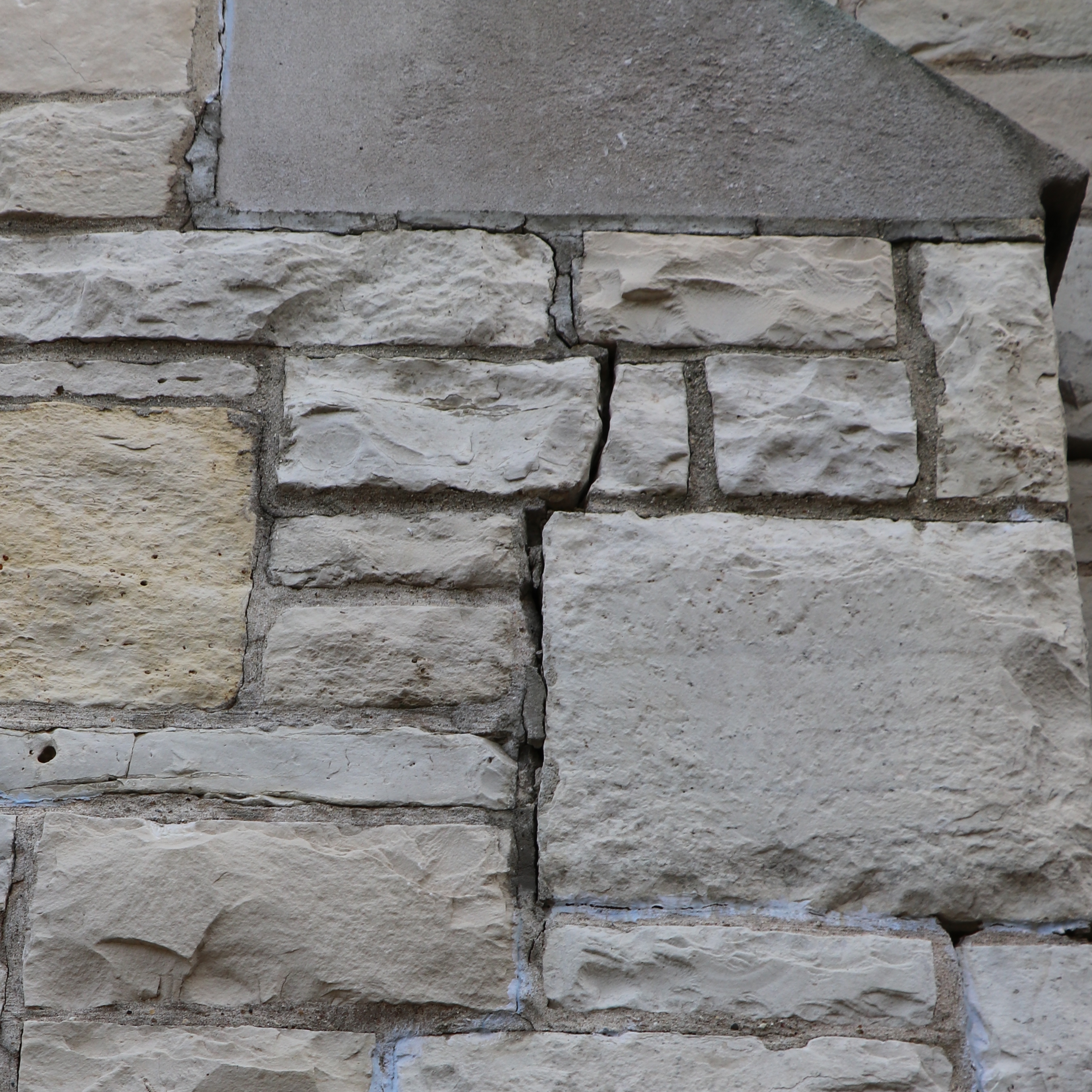 Large crack through stone and mortar