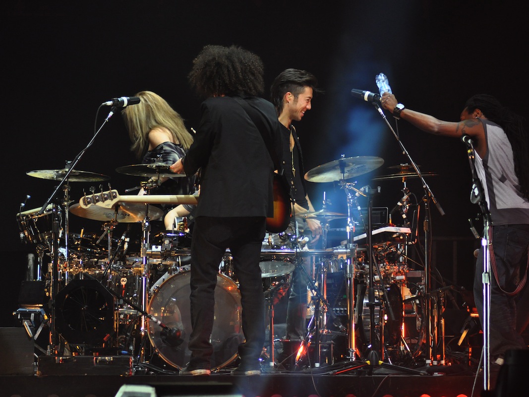 the band donating their percussive talents...